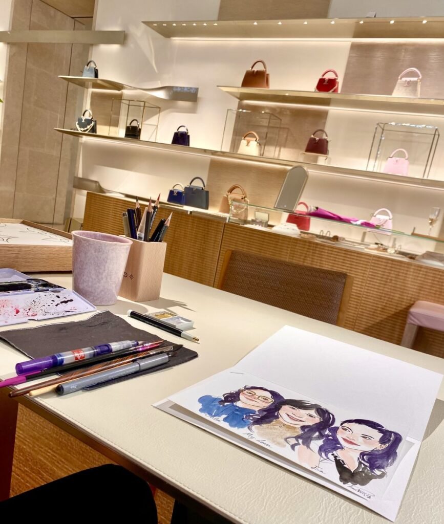 Live artist creating bespoke live portraits during a luxury retail activation in Paris.